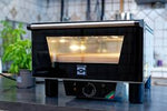 Front view of the Effeoven N3 500 °C with biscotto by Effeuno with internal light on - La Pizza Hub